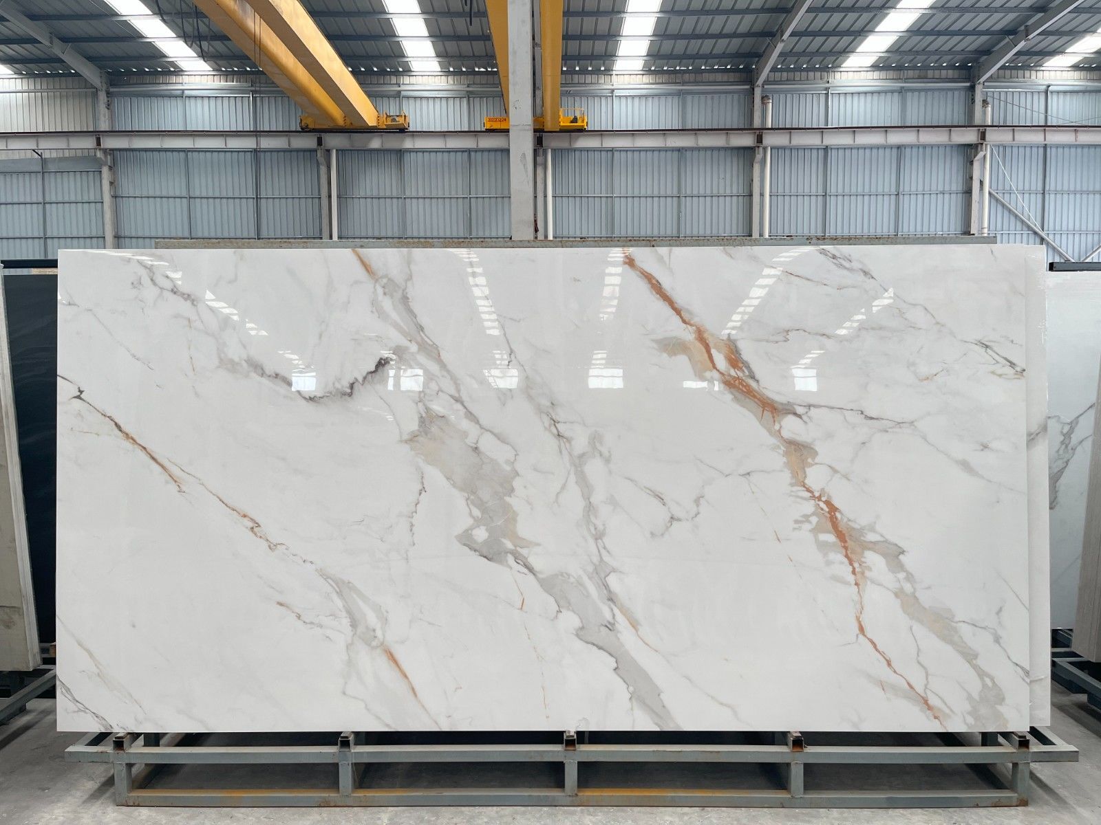 Carrara gold sintered stone