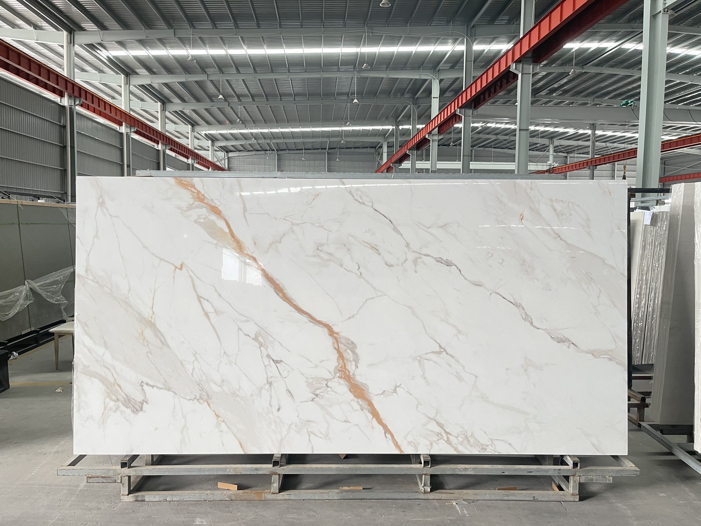 Carrara gold sintered stone