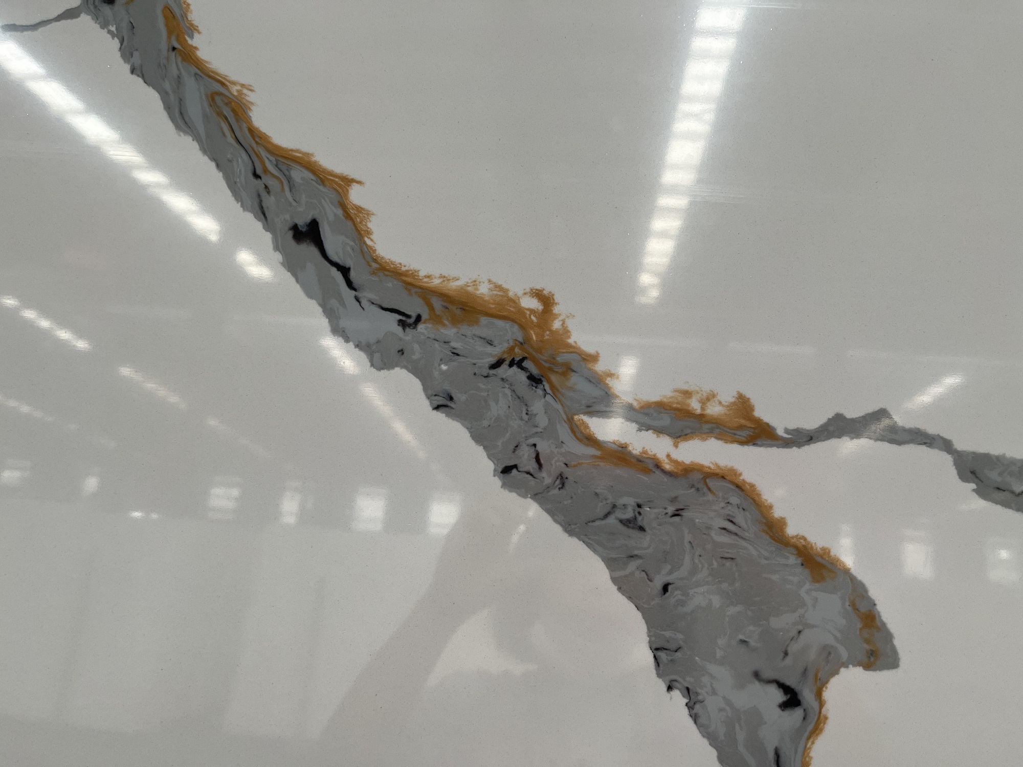 Calacatta quartz with gold veins