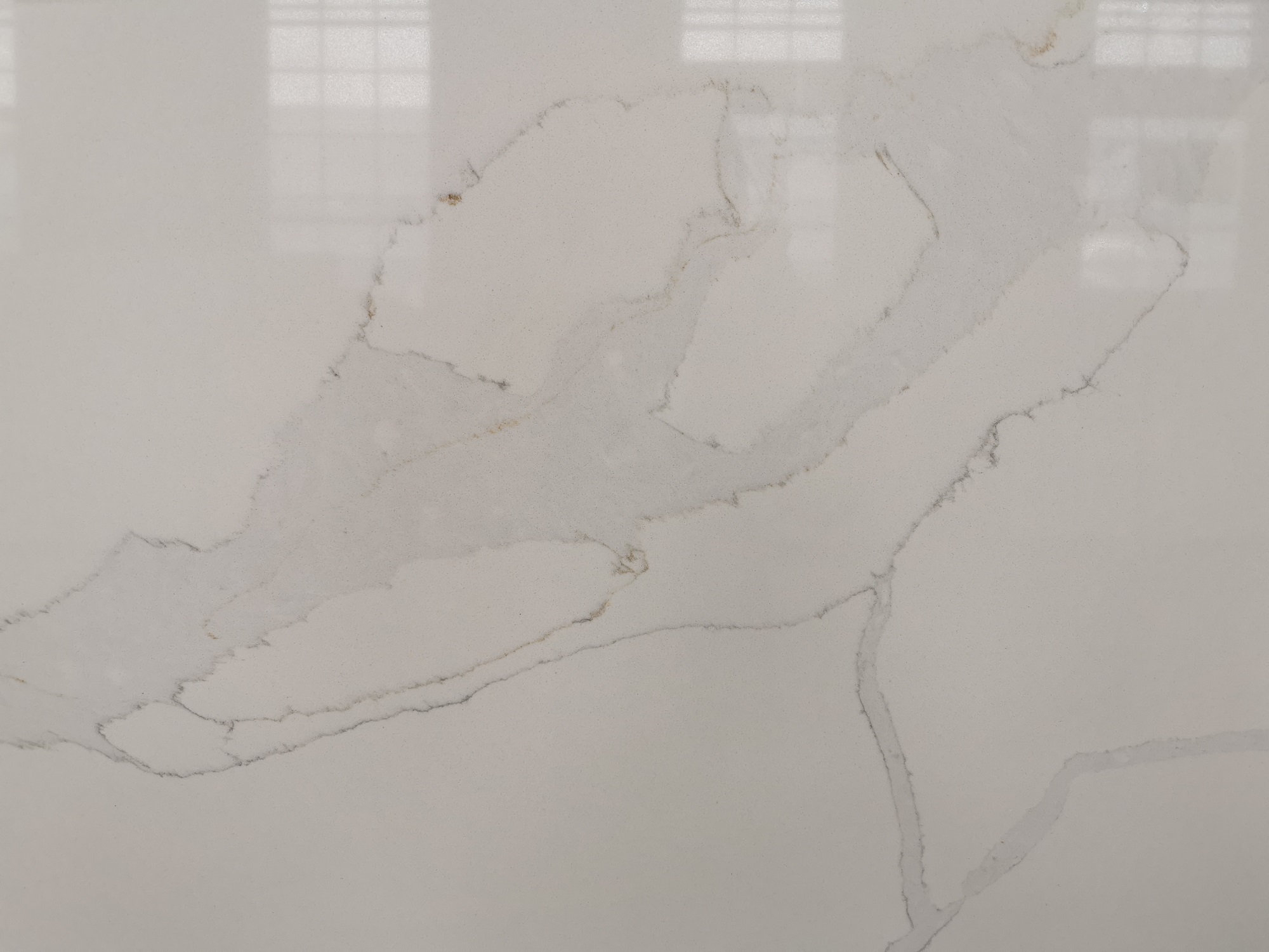 Calacacatta quartz with gold veins