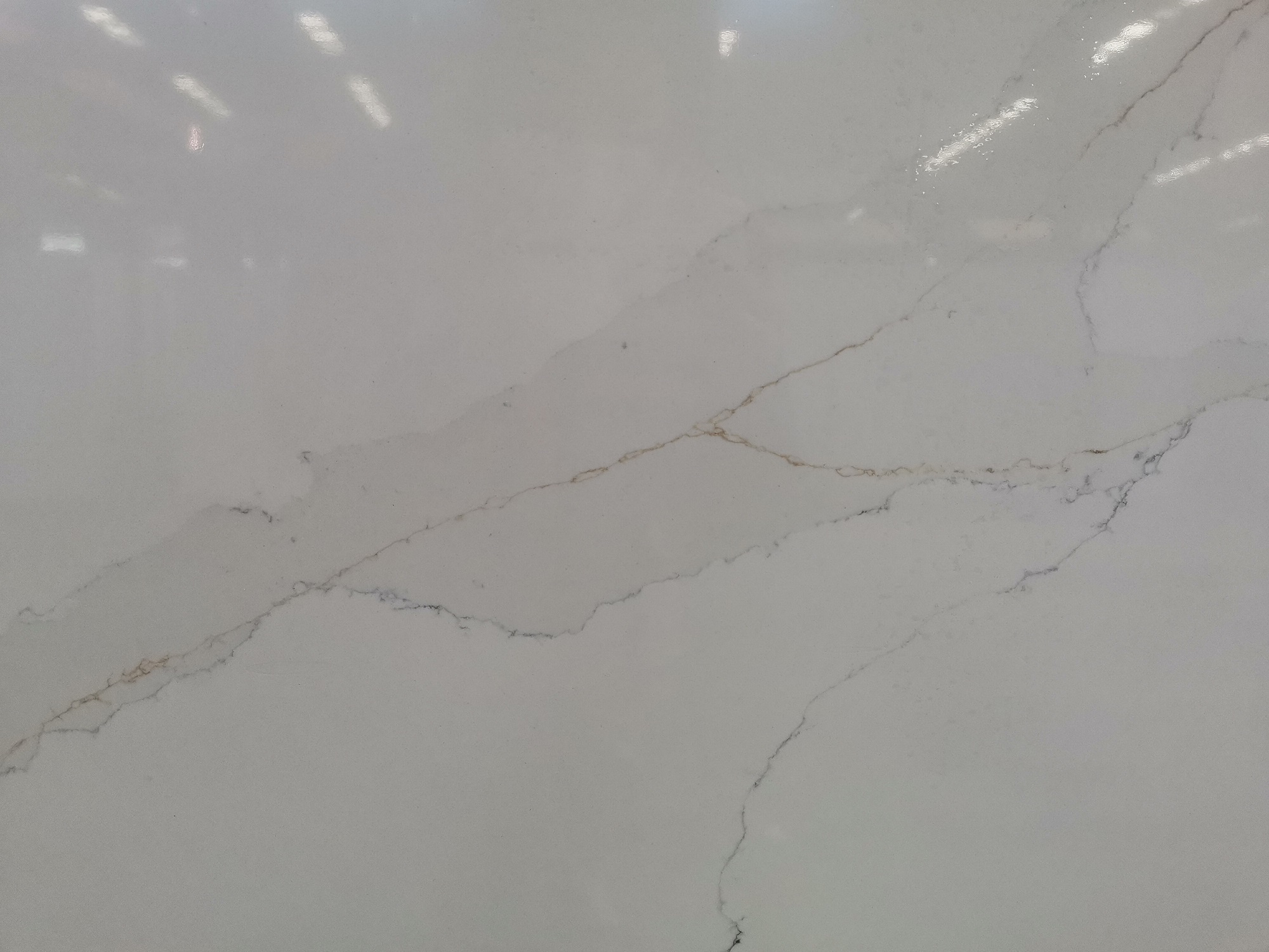 Calacatta quartz with gold veins