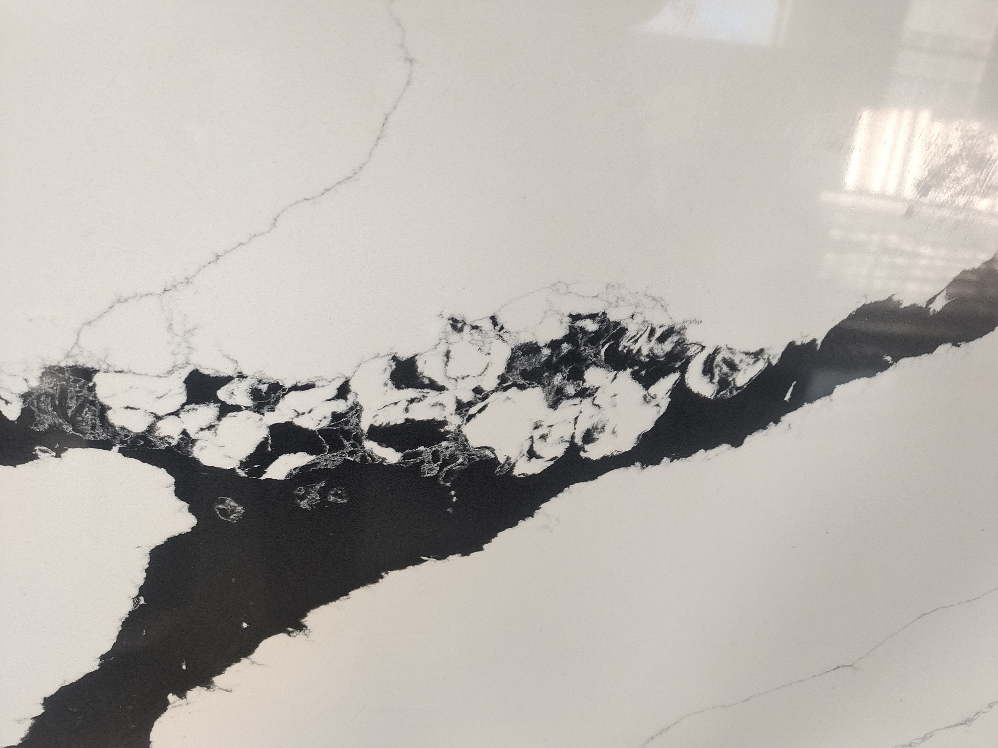 Calacatta quartz slab with black veins