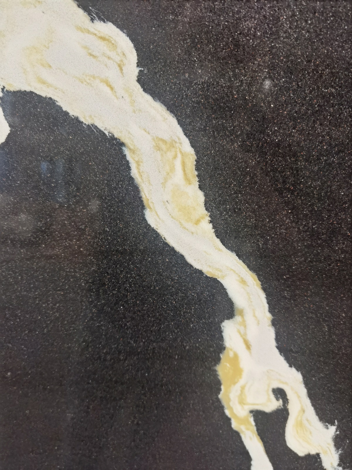 Black quartz with white veins