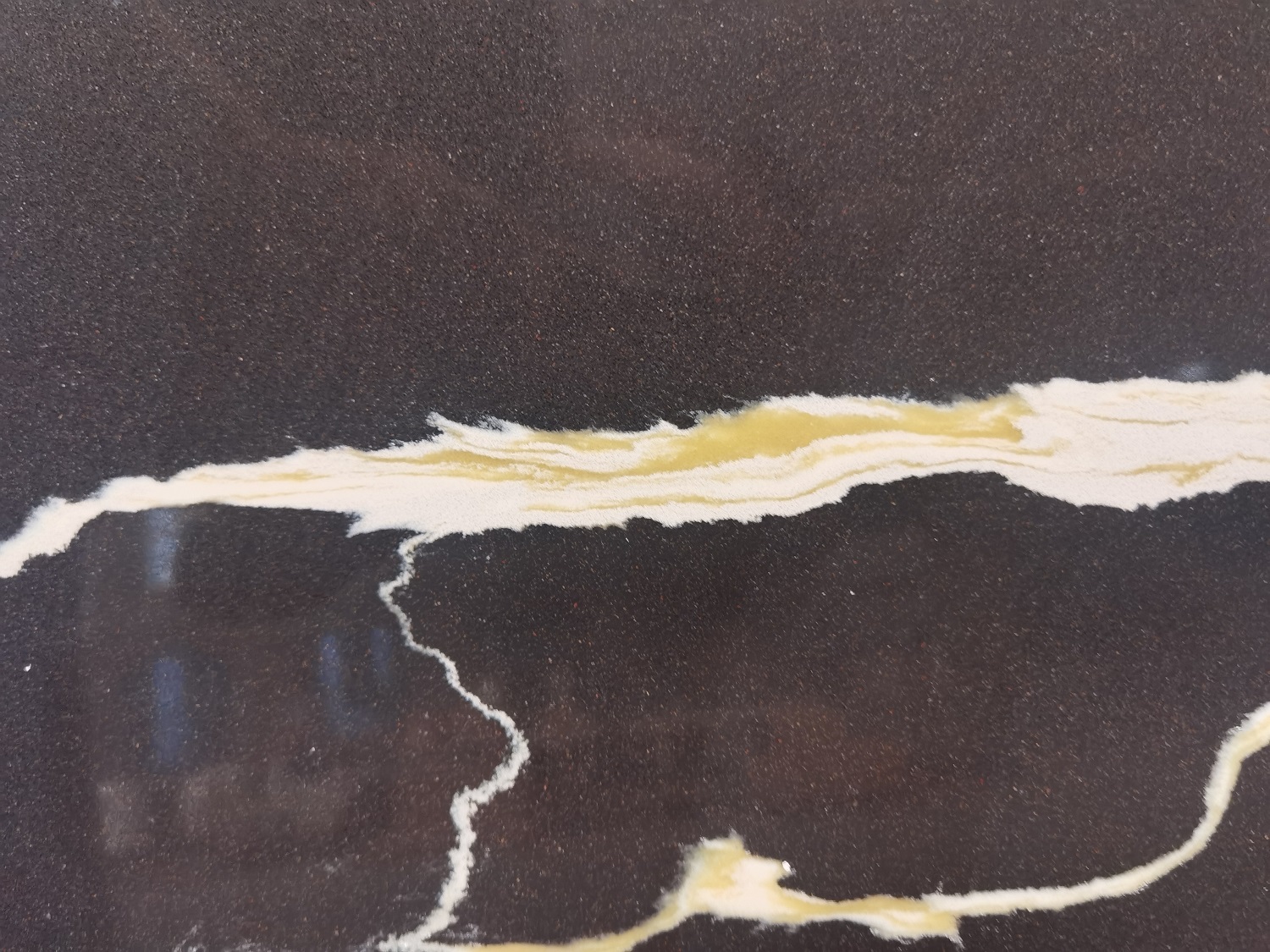 Black quartz with white veins