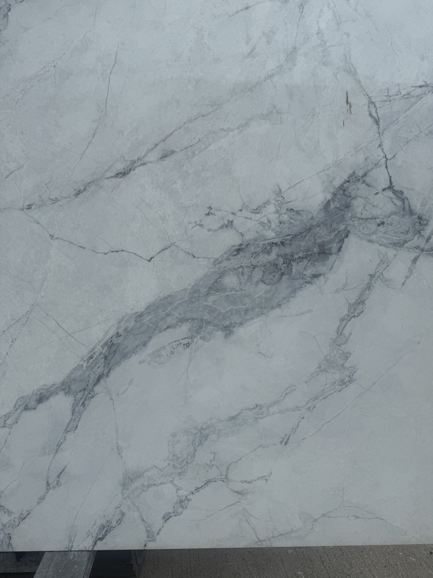 White marble looking printed quartz slab