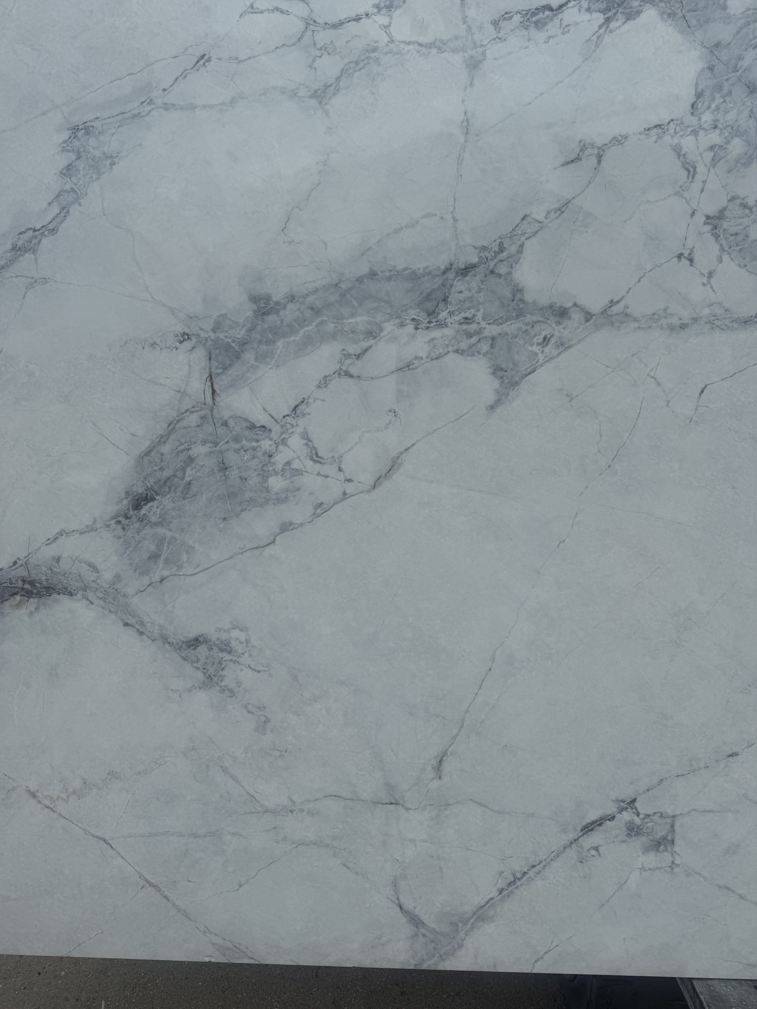 White marble looking printed quartz slab